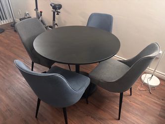 dining table with 4 upholstered chairs