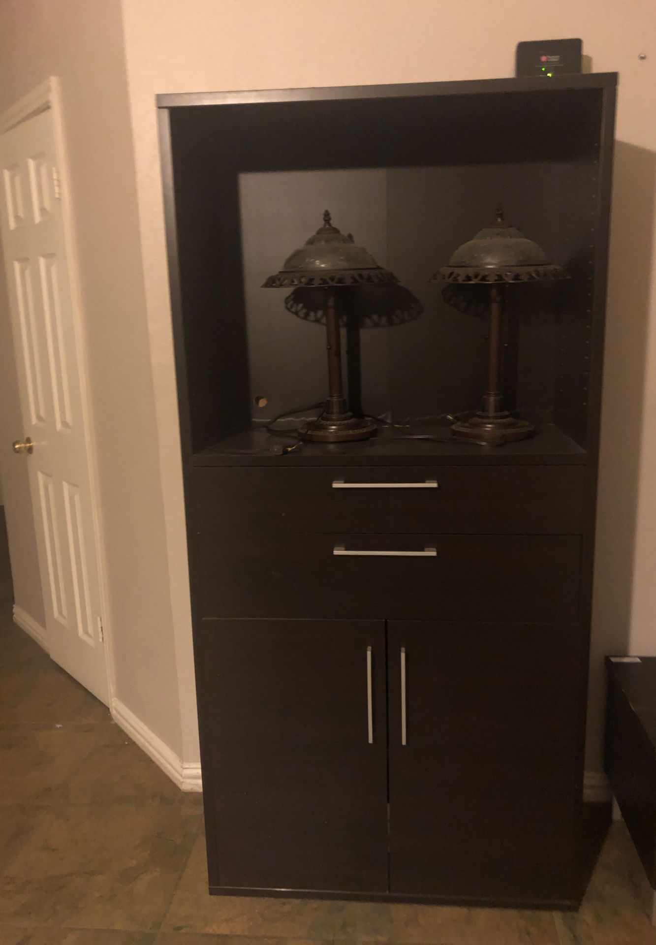 Small armoire and lamps. Brown armoire and oil bronze finish on lamps