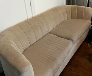 Living spaces couch in beige. 87 in