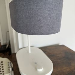 Nightstand lamp with changing colors and dimmer