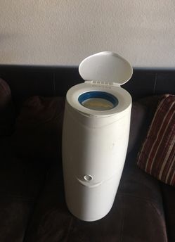 Diaper disposable bag dispencer