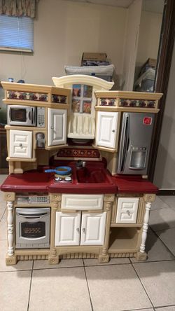 Kid little kitchen with accessories