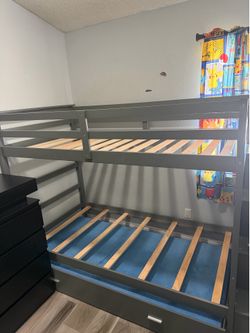Grey bunk bed with trundle and drawers