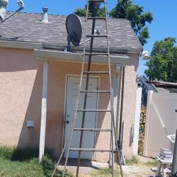 Old Tall Wooden Ladder