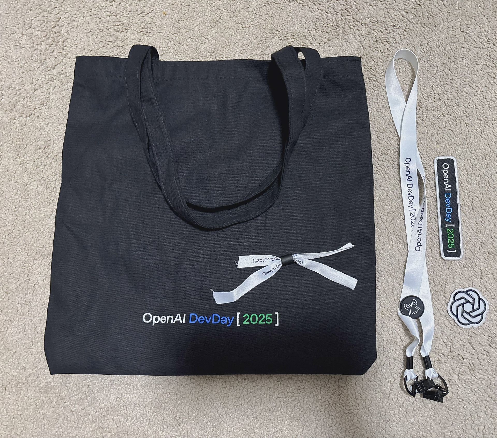 New OpenAI Devday 2025 canvas bag badge rope sticker patch embroidered iron on patch Got it from the devday conference 1- black canvas bag size 15.5