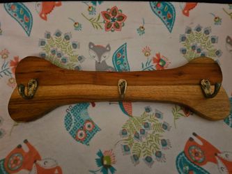 Vintage wooden dog bone shaped leash holder