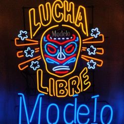 MODELO ( LUCHADOR ) NEON SIGN .( ALSO PLENTY OF NEON SIGNS / LIGHTS AVAILABLE FOR SALE )DODGERS & ANGELS BOBBLEHEADS AVAILABLE. TAP HANDLES