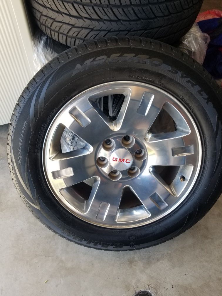 20 in Factory GMC rims and tires