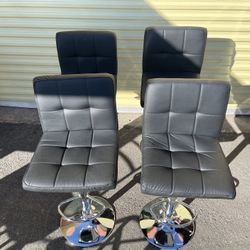 Black Faux Leather Adjustable Height Swivel Chair $40 each, 4 In Stock Available Decatur/Hacienda