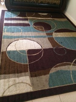 8by 10. Rug