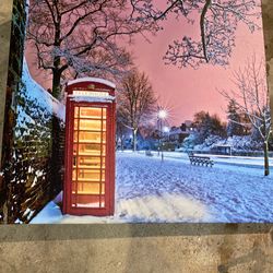 Red Phone Box Covered In Snow