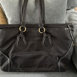 Large TUMI Black Canvas & leather Tote/ Laptop Handbag Good For Travel With Many Pockets Inside Measures About 11” X 15.5” X 4.75” In Excellent Condit