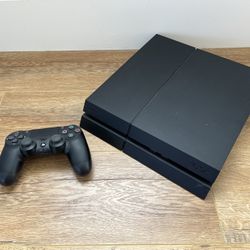 Sony PlayStation 4 (with TWO controllers)