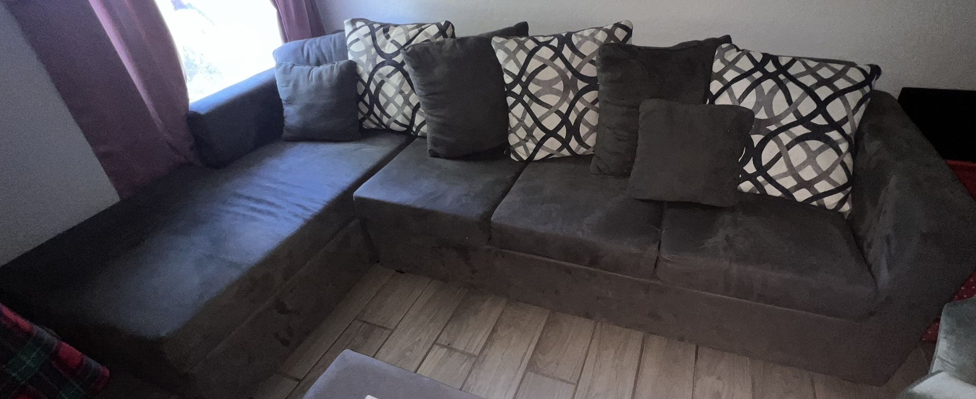 gray sectional with ottoman
