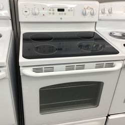 GE 4 Burner Glass Top Range. 1 year Warranty 
