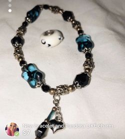 Bead bracelet and charm