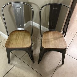 2 manufactured metal chairs