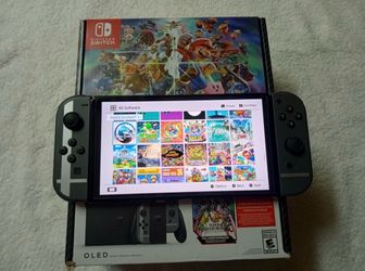 NINTENDO SWITCH OLED with 7500 GAMES INSTALLED and 512GB SD