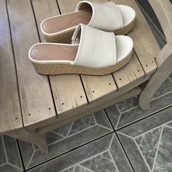 While ladies sandals used like new condition  size 8