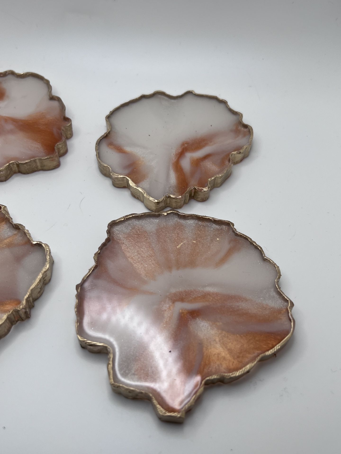 Set Of Four Copper And White Handmade Resin Coasters