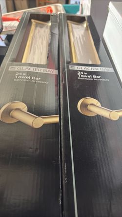 2- glacier Bay 24 inch towel bars brushed gold