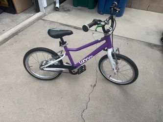 Woom 3 go 16 inch with auto magic 2 speed rear hub makes it easier for take off and general riding bike is the newer one with new style chainguard bik