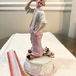 Musical Clown and dog figurine