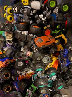 Large Bin of Monster Trucks and Hot Wheels