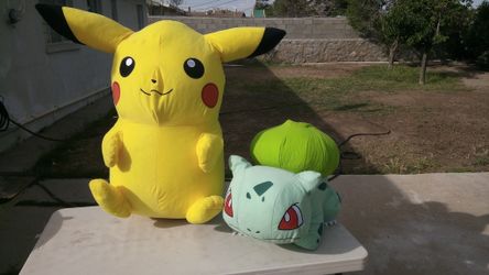 Huge jumbo Pikachu and Bulbasaur plush.