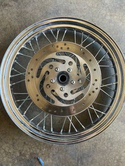 Harley-Davidson 19x2.50 chrome laced wheel rim.