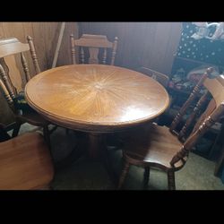 Dining table 48" round, 4 Chairs. 