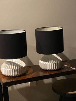 Set of 2 DUNE Table Lamps From Orbit Lighting With Textured Pleated White Base and Contrasting Black Fabric Drum Shades H17.5”