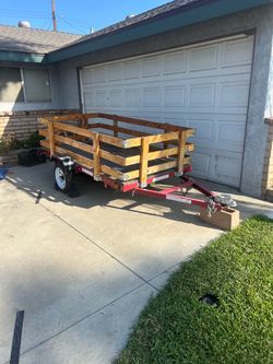 Haul Master Single Axle Utility Trailer with Wood Side Rails