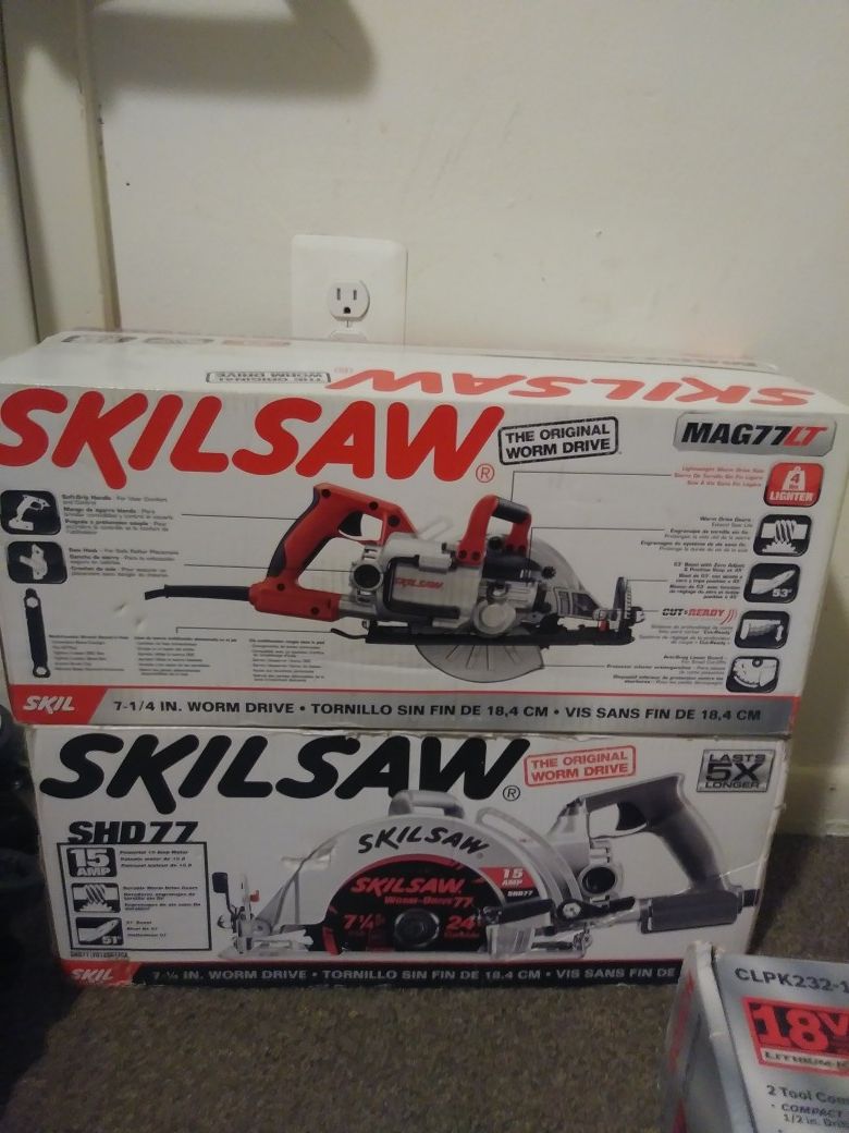 Two Black and red Skilsaw