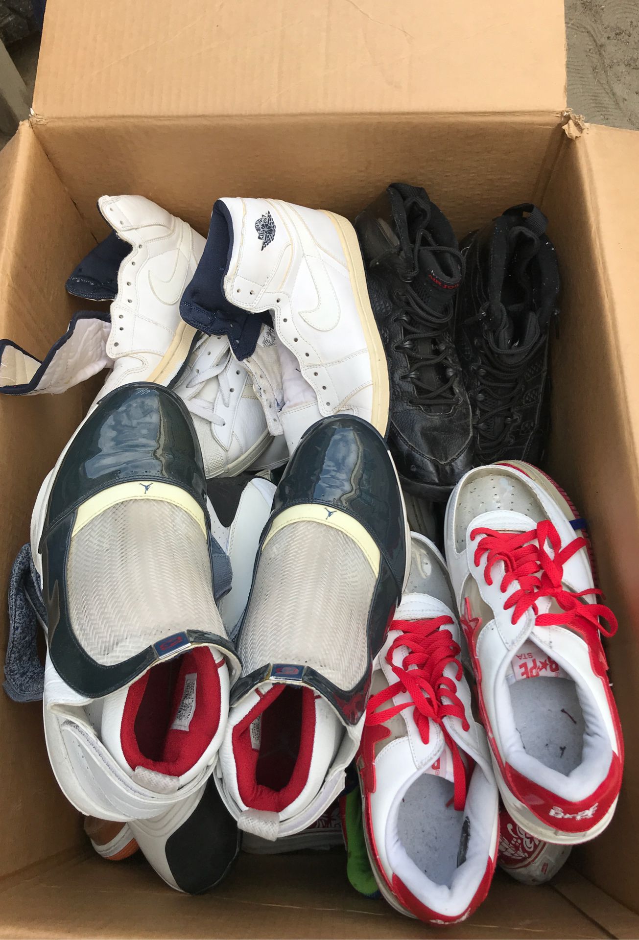 Box of Jordan’s BAPEs Adidas Vans