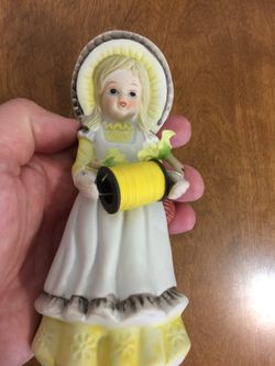 Vintage ceramic sewing girl