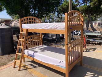 Wood bunk bed with 2 twin mattresses delivery available