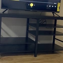 Adjustable Storage TV Stand for TVs up to 50" Black Wood Grain Finish - Room Essentials™