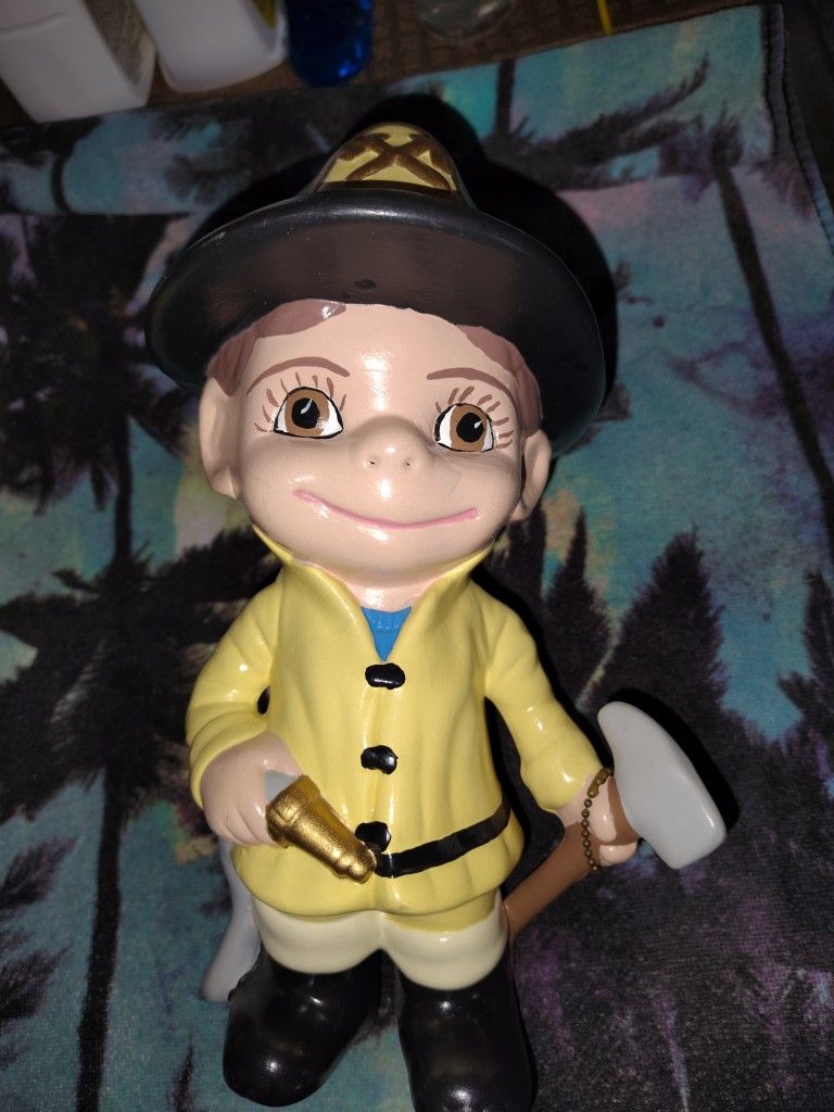 Vintage Fireman Statue