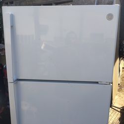 Ge top freezer refrigerator