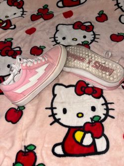 Pink Revenge X Storm sneakers with white lighting bolt