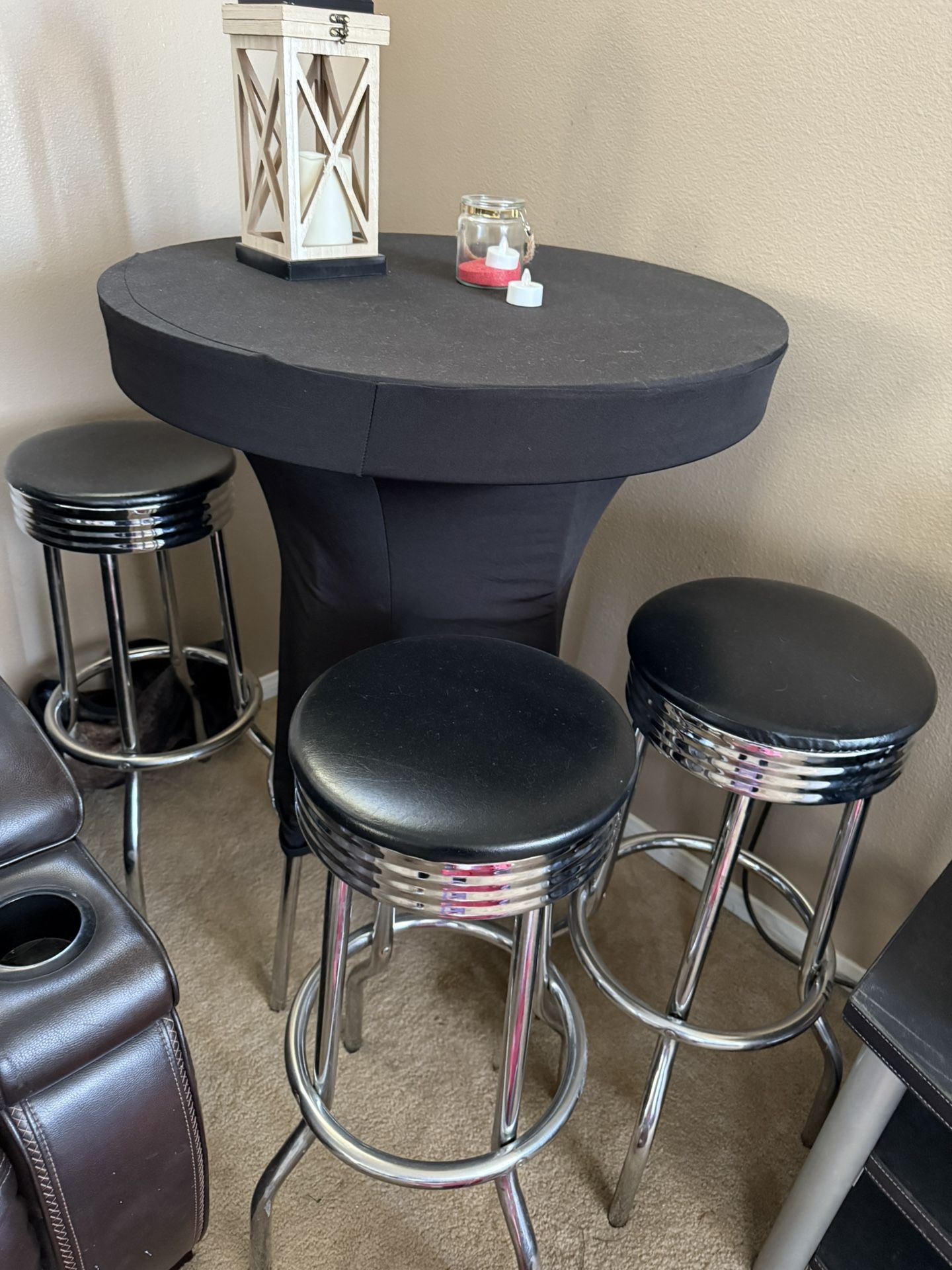Bar Tables With Stools And Black Covers 