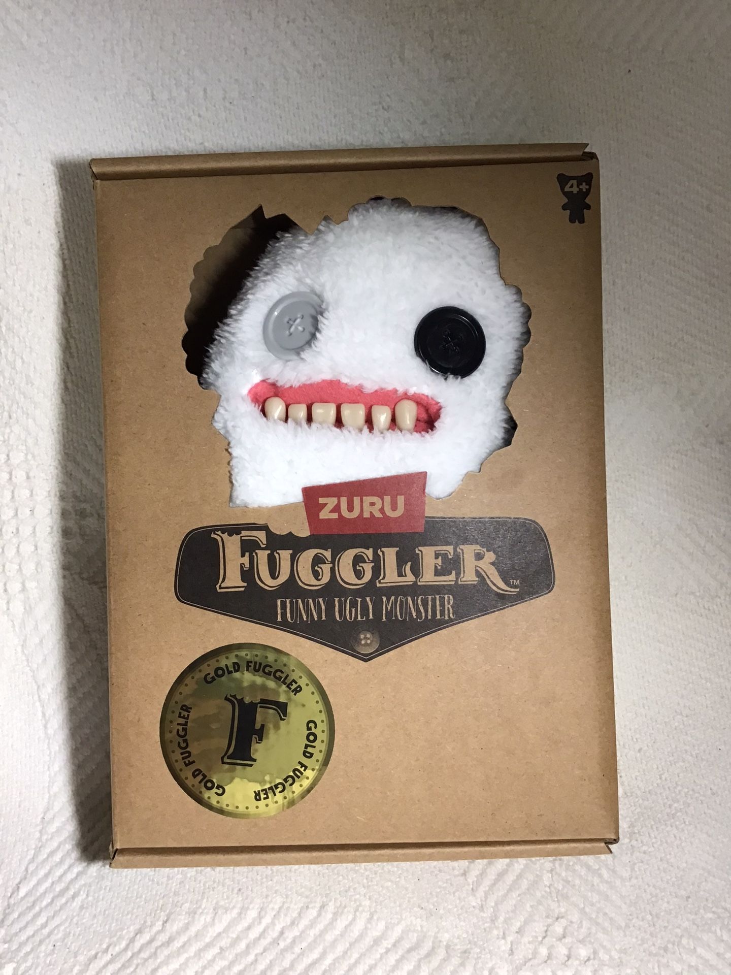 FUGGLER FUNNY UGLY MONSTERS / 2 White / 2 Blue/ 1 Purple Each $17
