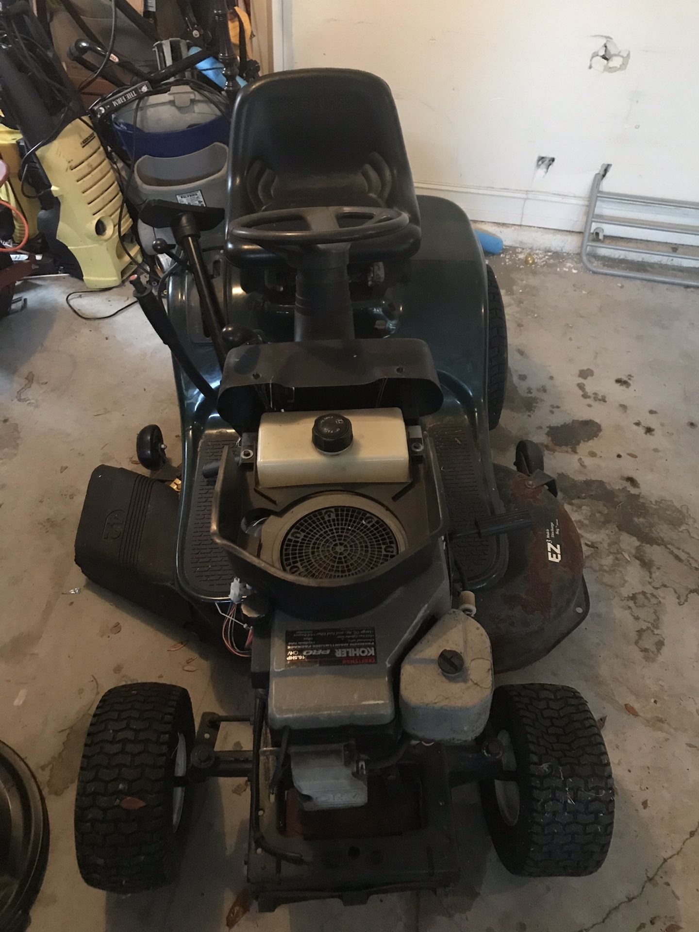 Ride along Lawn Mower