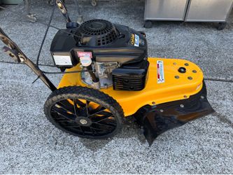 Cub Cadet ST100 Walk Behind String Trimmer