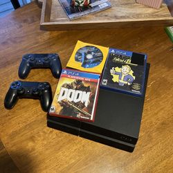 PS4 W/ Games and Controllers