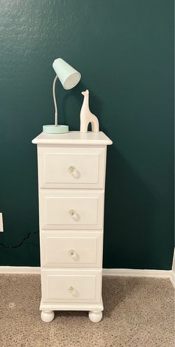 Adorable White Wood Four Drawer Dresser with Glass Knobs