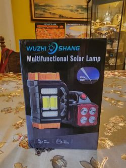 Multifunction Solar Power Bank & Flashlight. Can be charged by solar or electrical plug. Has outlets to use as power bank to charge your phone or othe