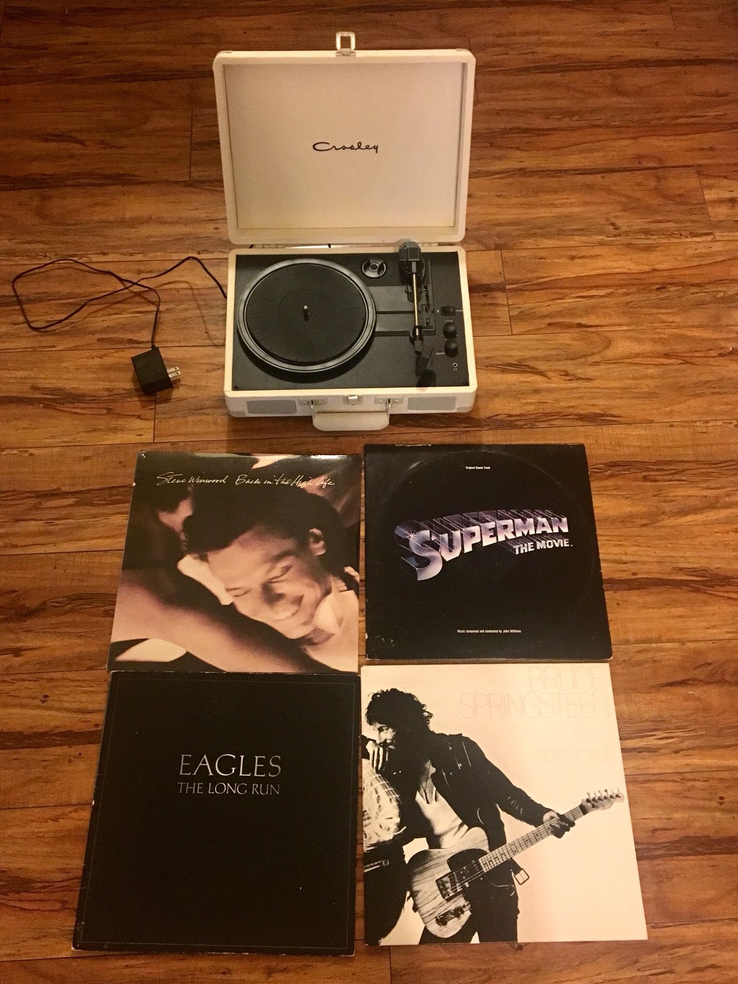 White crosley suitcase record player lot with bruce springsteen eagles steve winnwood and superman soundtrack