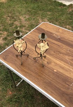 Pair of cherub candle holder